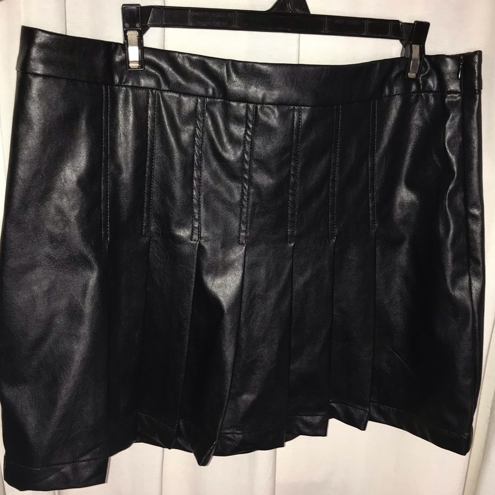 Leather pleated mini skirt.